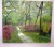Chemin sous un sous-bois et banc