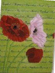 Deux coquelicots sur fond vert avec une écriture sur le thème de la fleur