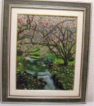 Ruisseau dans un parc sous des magnolias
